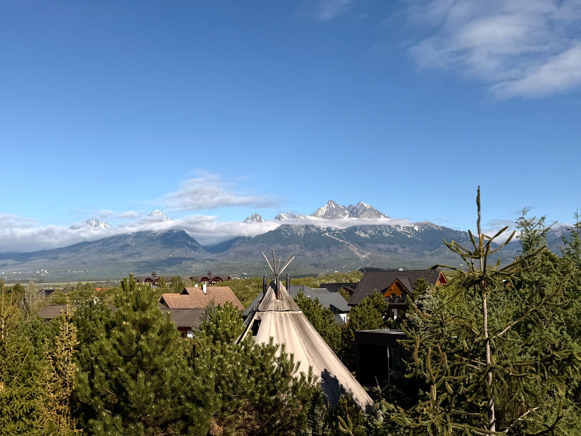 The snow-tipped High Tatras seen from Edenium Chalet