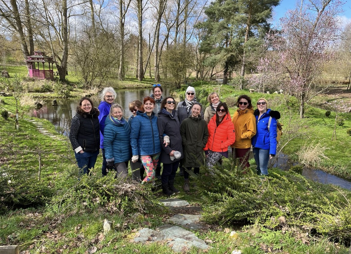 West Lexham retreat group by the pond, Norfolk