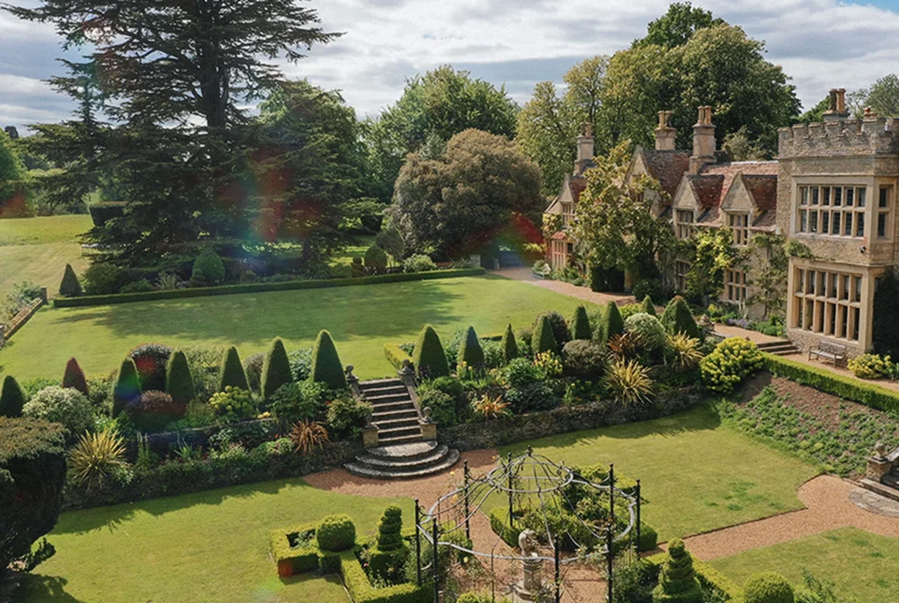 Aerial view of Tofte Manor and its gardens